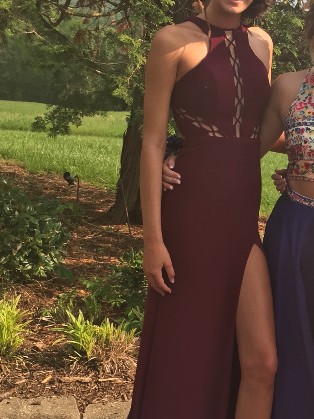 Faviana Lace-Up Cutout Prom Gown in Burgundy